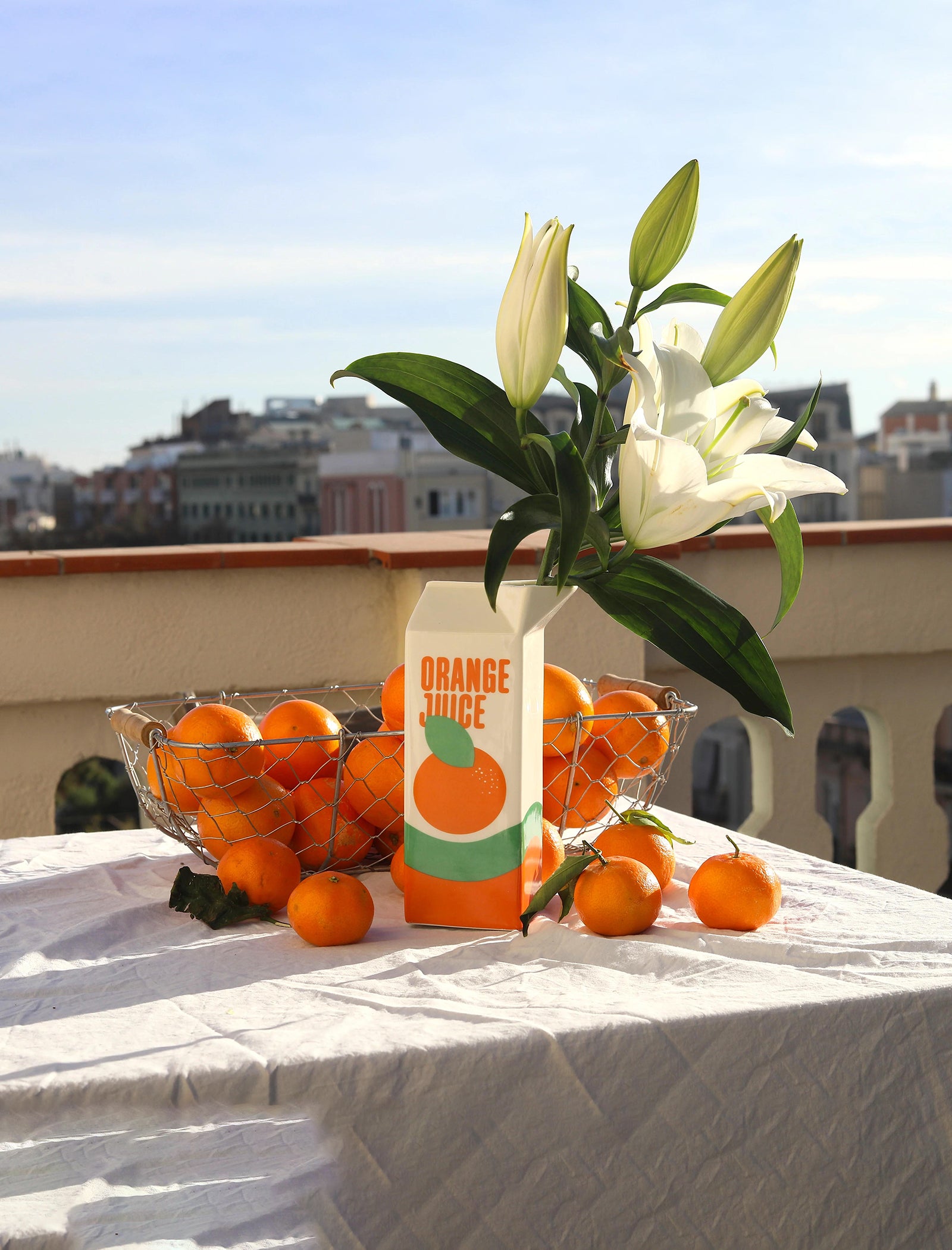 Orange juice container vase